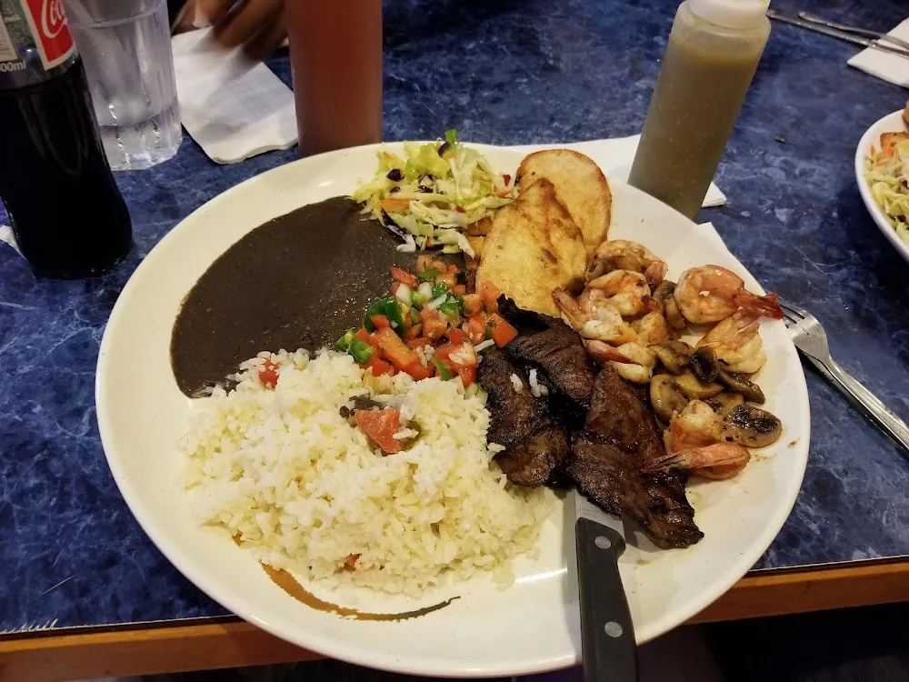 Tres Compadres Beef Chicken and Shrimp with Rice and Beans